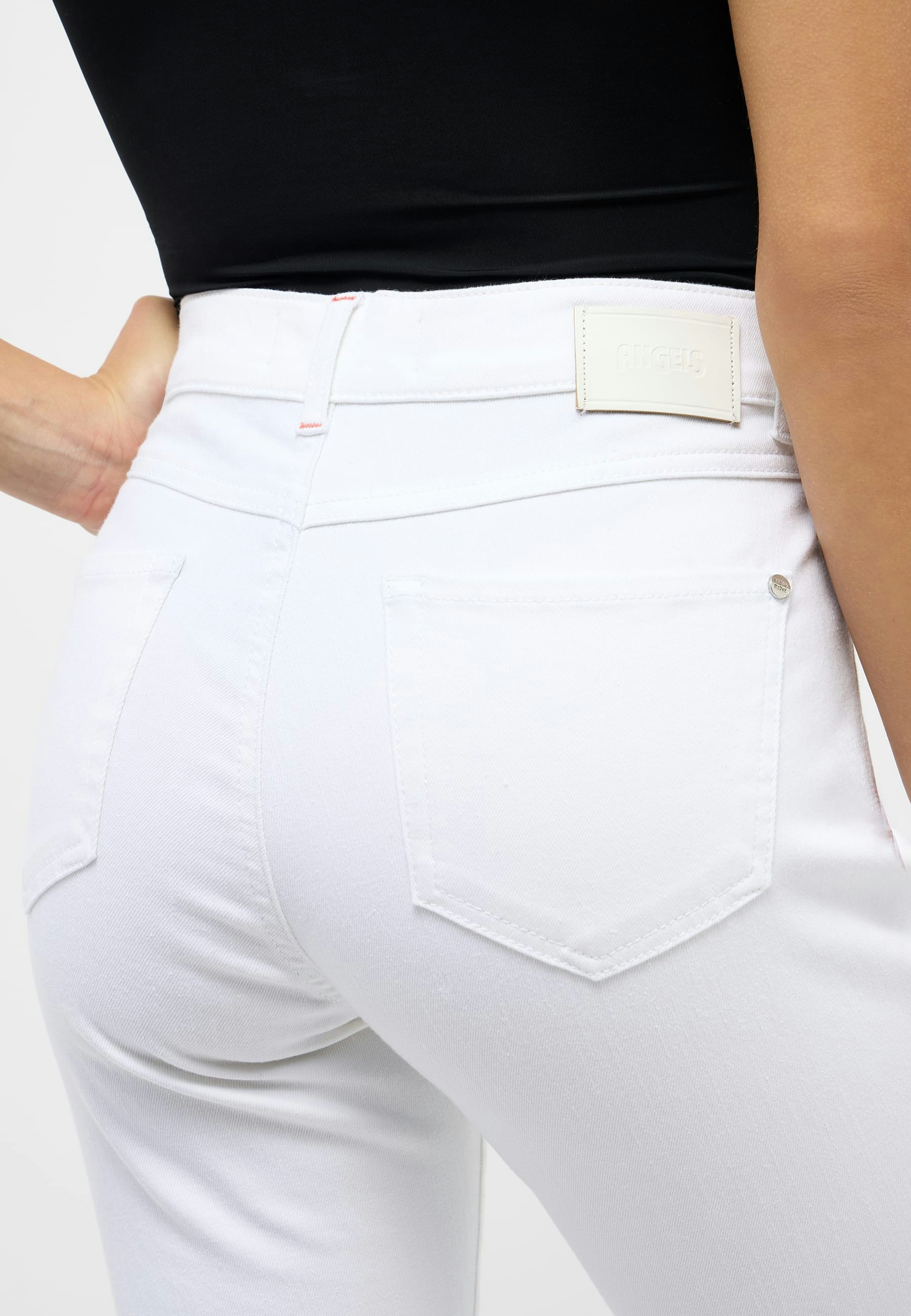 White jeans with fringe hem hotsell