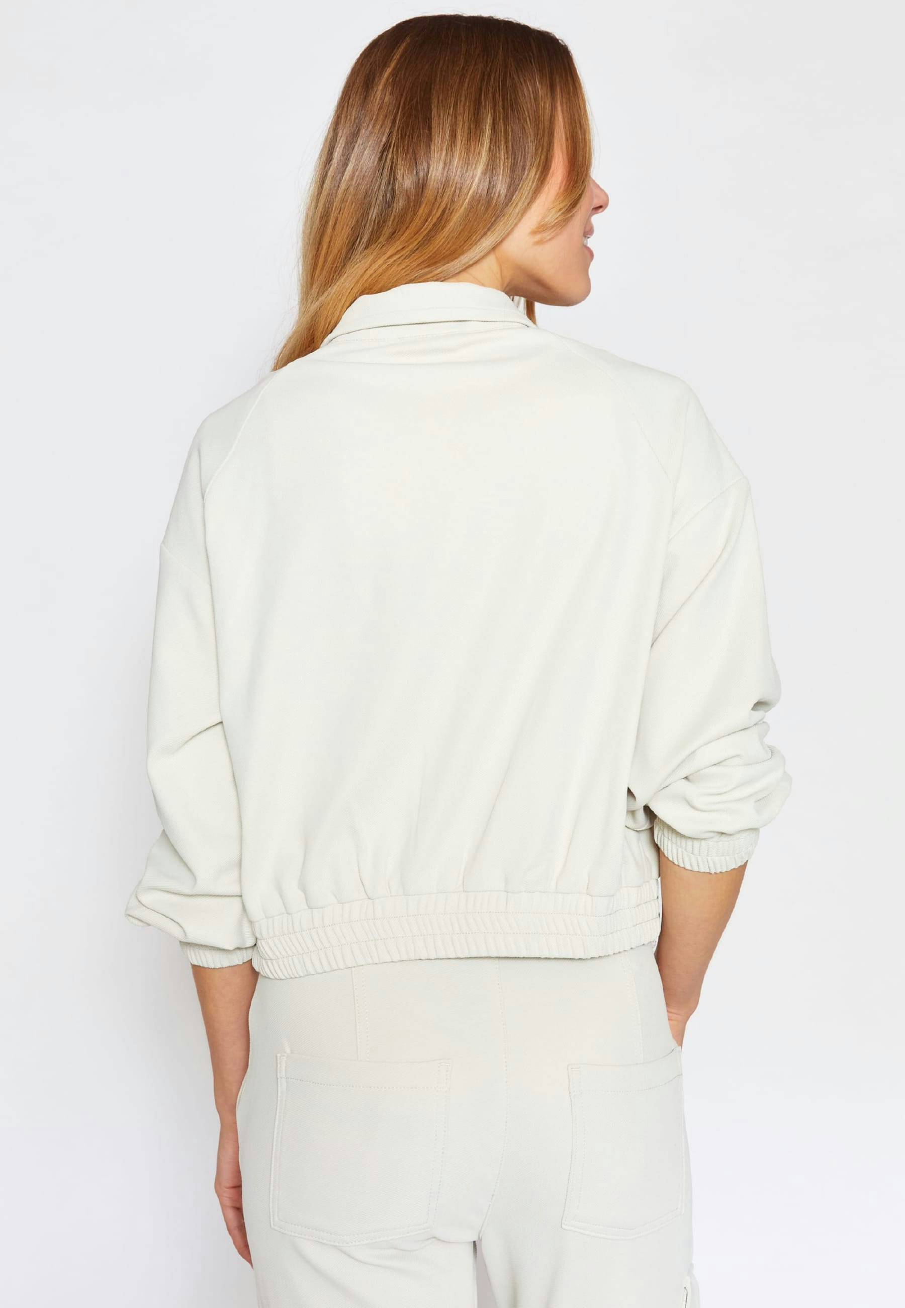 Solid blouson with front pocket